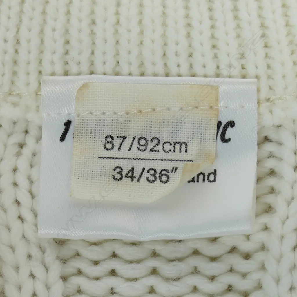 An unused MCC player jersey - identified as a 'player ' garment by the emblem directly centred below the V neck, Image 1++