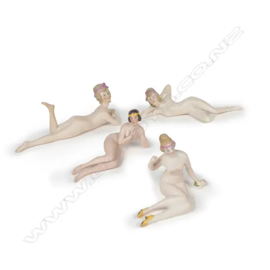 Four early 20thC bisque piano bathing beauties