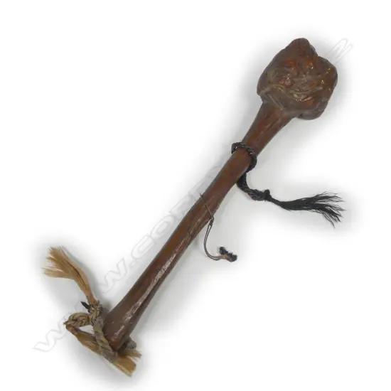 A Fijian rootstock ula (throwing club)