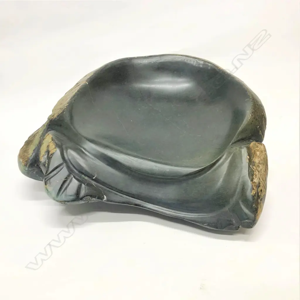A large dark green pounamu carved boulder bowl Image 1++