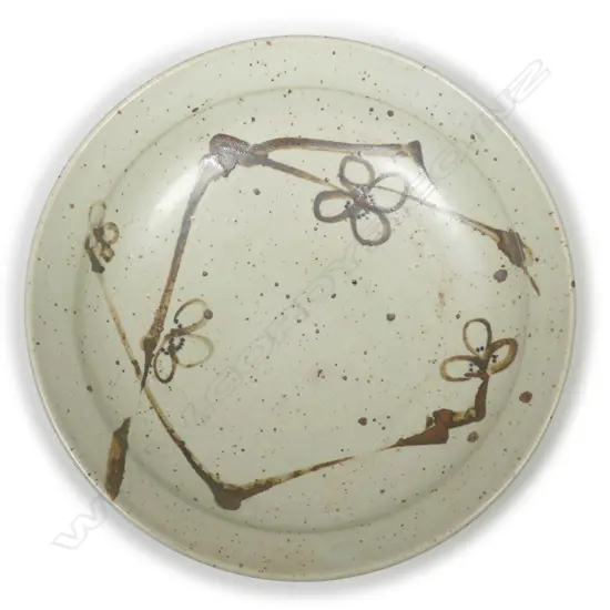 A Len Castle shallow bowl plain speckled glaze with painted quince blossom motif