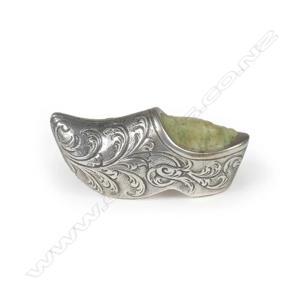 A miniature silver pin cushion Image 1++