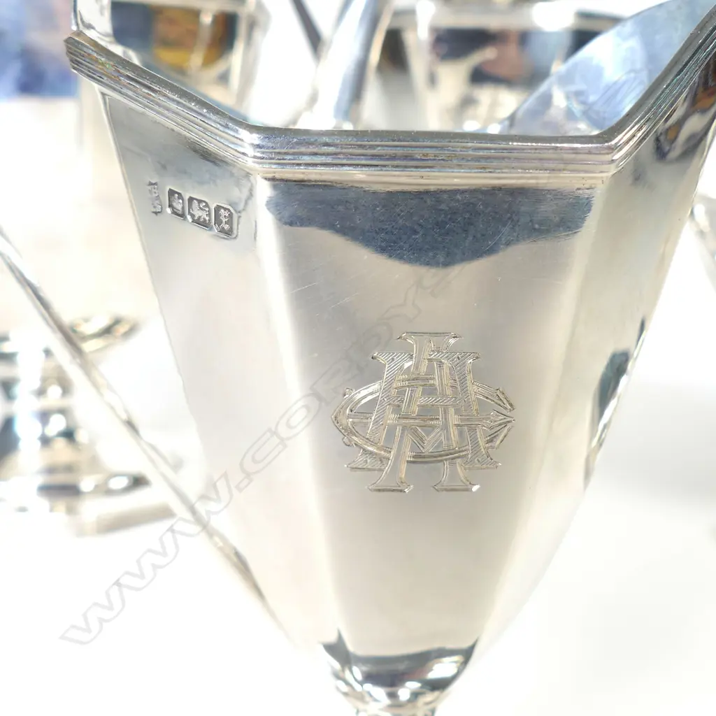 A sterling silver four piece tea set Image 1++