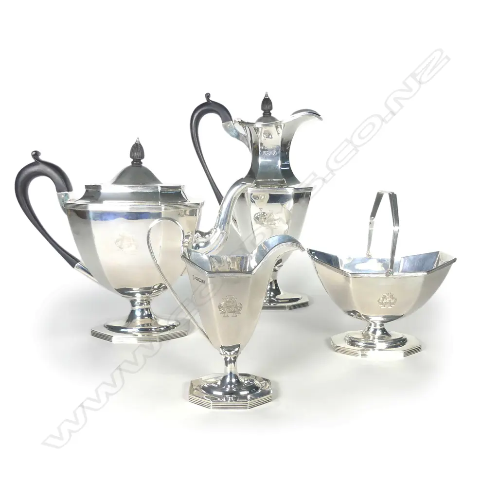 A sterling silver four piece tea set Image 1++