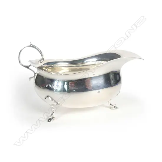 A silver fat belly sauce boat