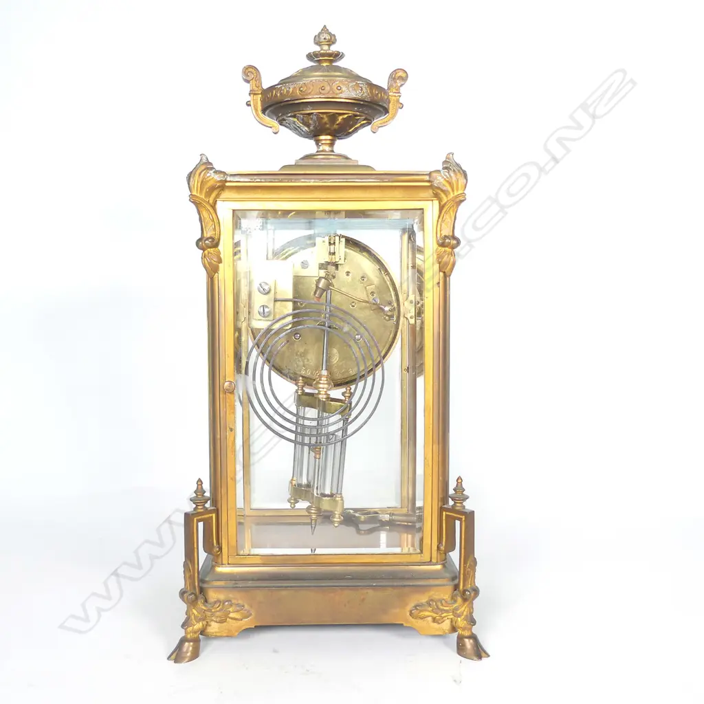 A French brass four glass two train mantel clock Image 1++