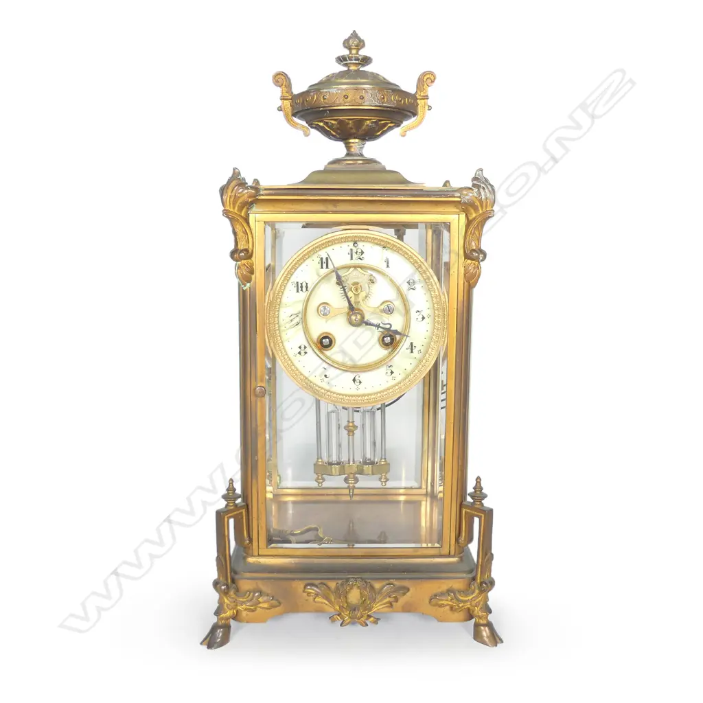 A French brass four glass two train mantel clock Image 1++