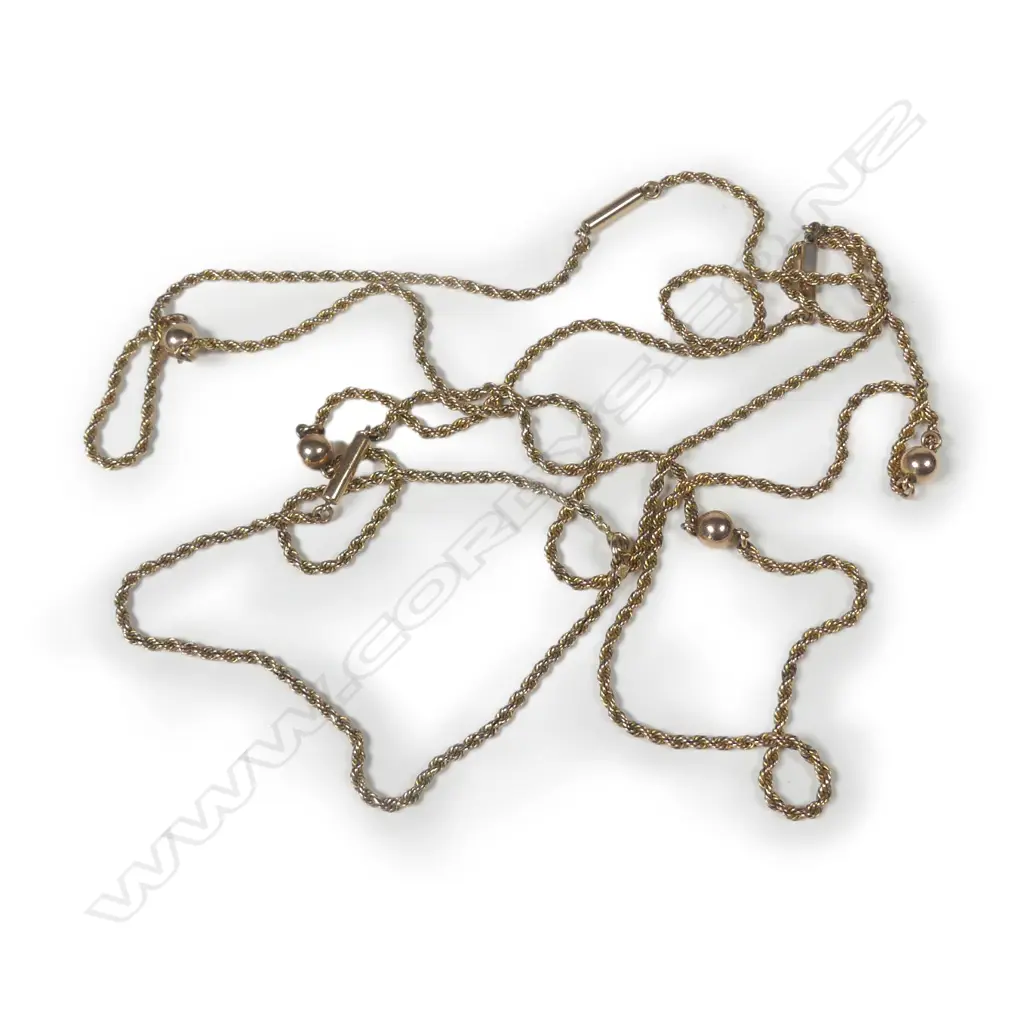 A 9ct rose gold muff chain Image 1++