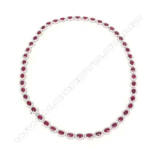 A platinum ruby and diamond necklace