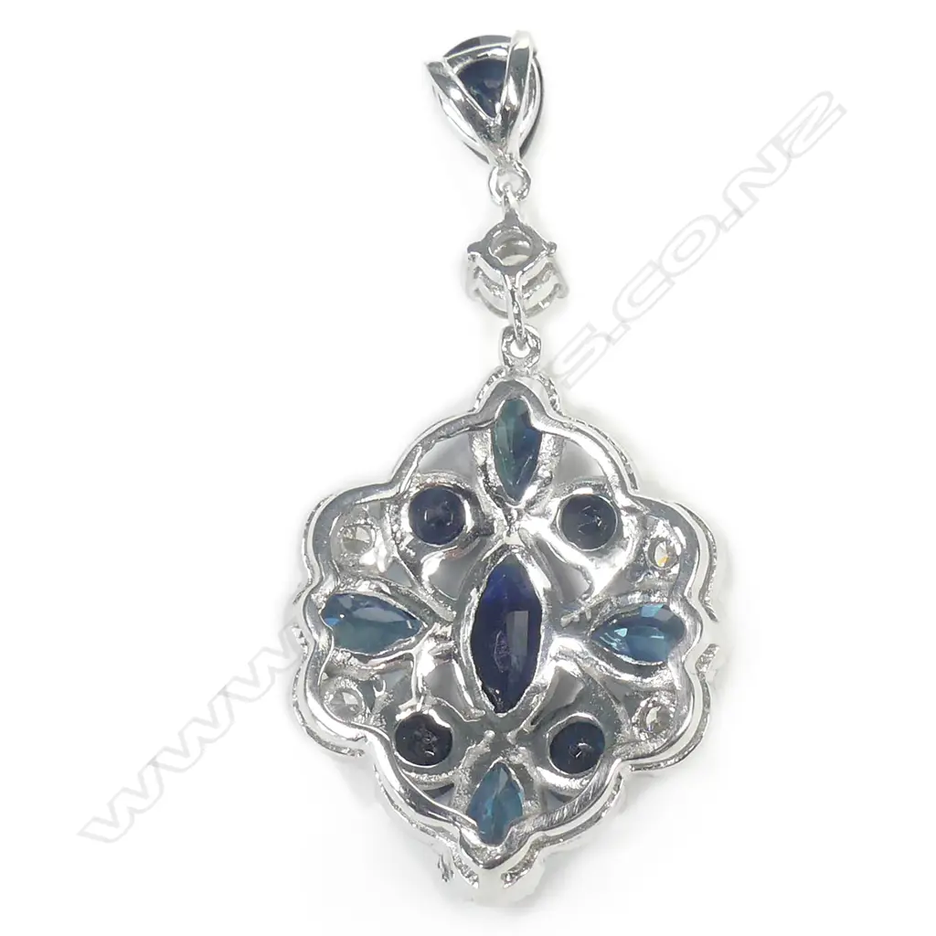 A 14ct white gold sapphire and diamond pendant Image 1++