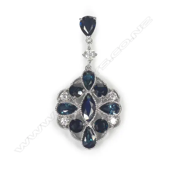 A 14ct white gold sapphire and diamond pendant
