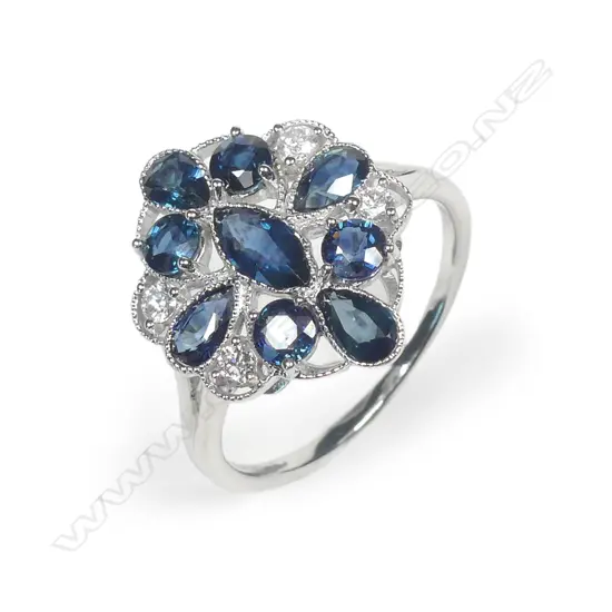 A 14ct white gold sapphire and diamond ring