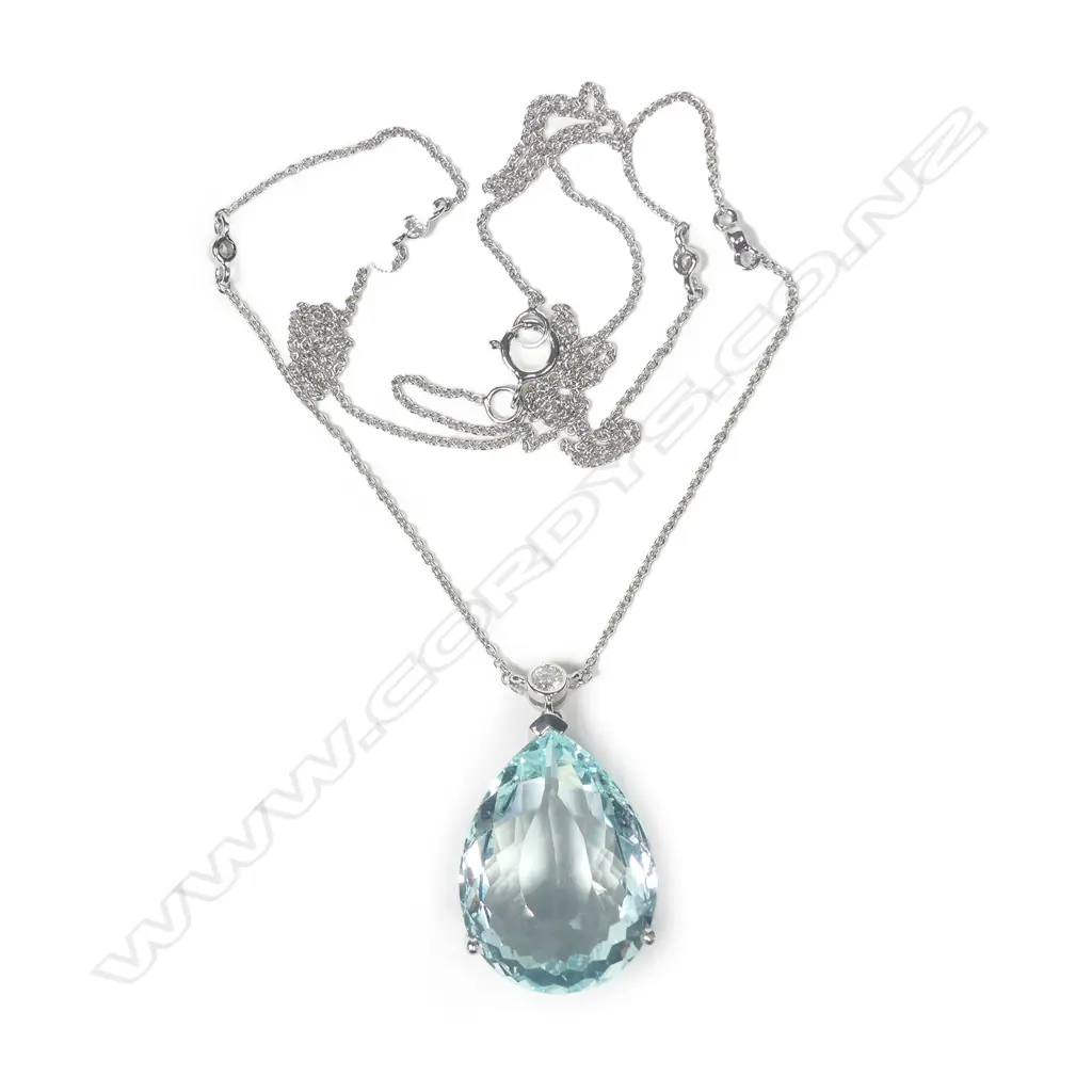 A 14ct white gold aquamarine and diamond pendant Image 1++