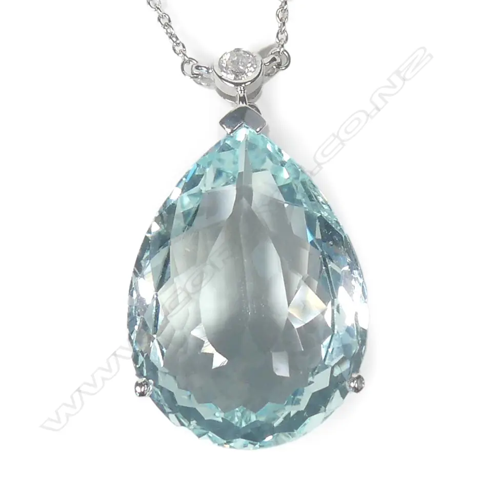 A 14ct white gold aquamarine and diamond pendant Image 1++