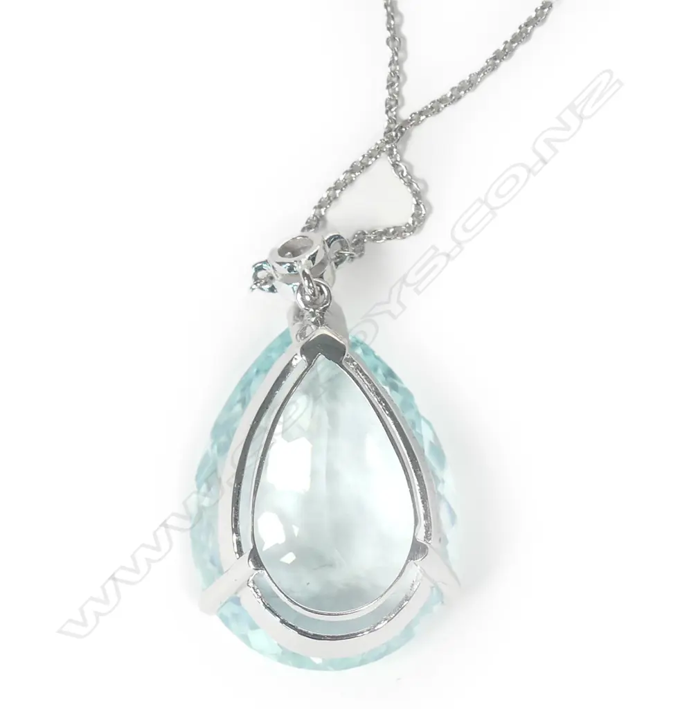 A 14ct white gold aquamarine and diamond pendant Image 1++