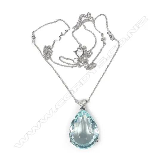 A 14ct white gold aquamarine and diamond pendant