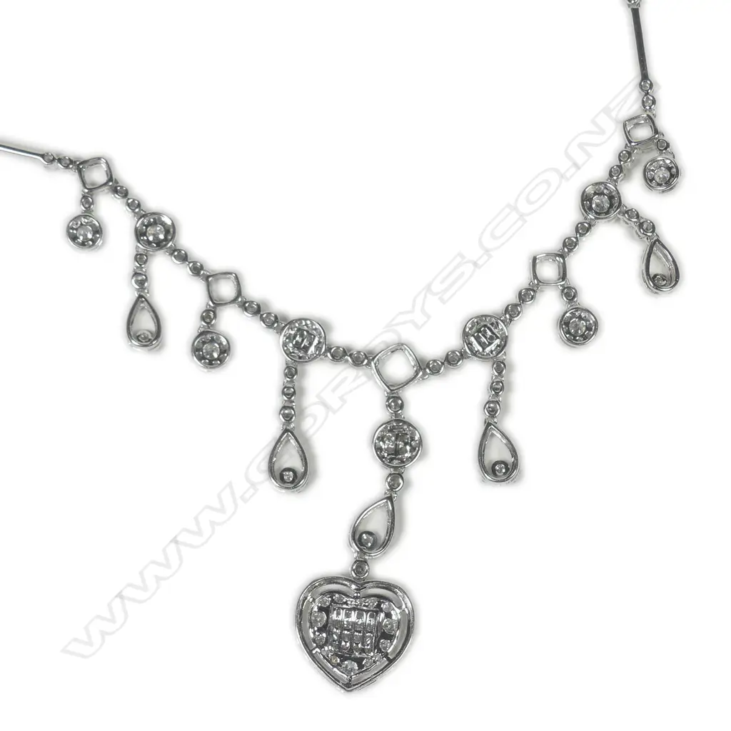 An 18ct white gold and diamond set necklace Image 1++