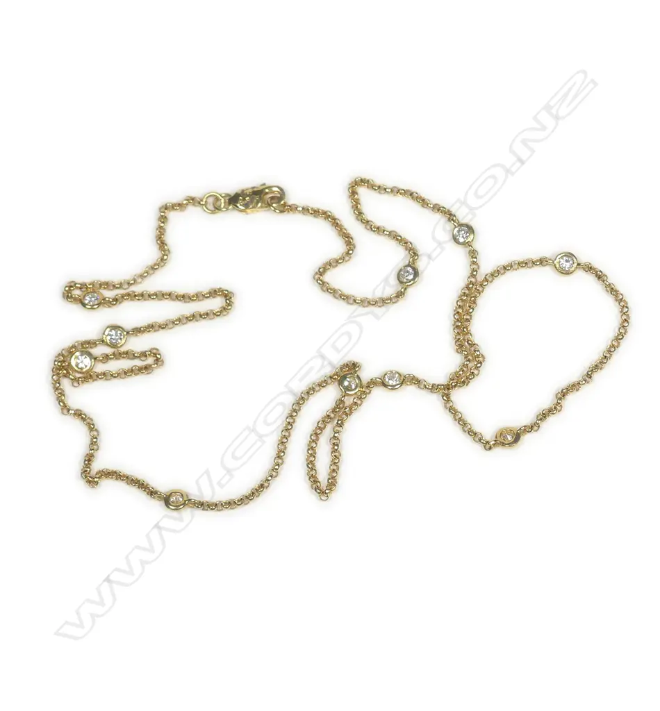 An 18ct yellow gold diamond set necklace Image 1++