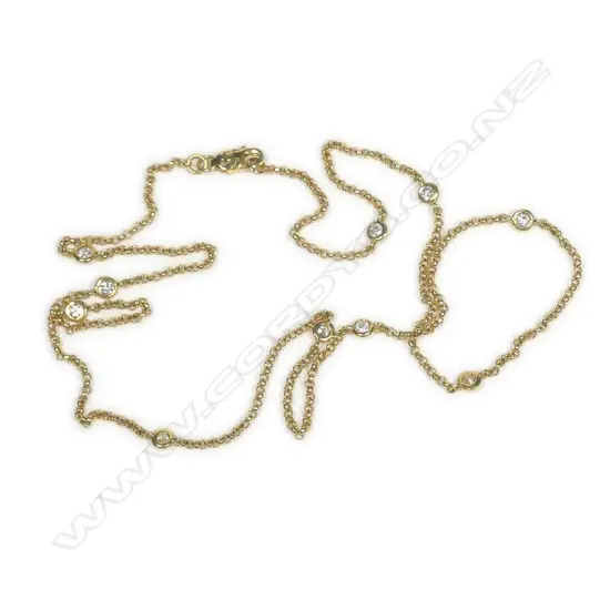 An 18ct yellow gold diamond set necklace
