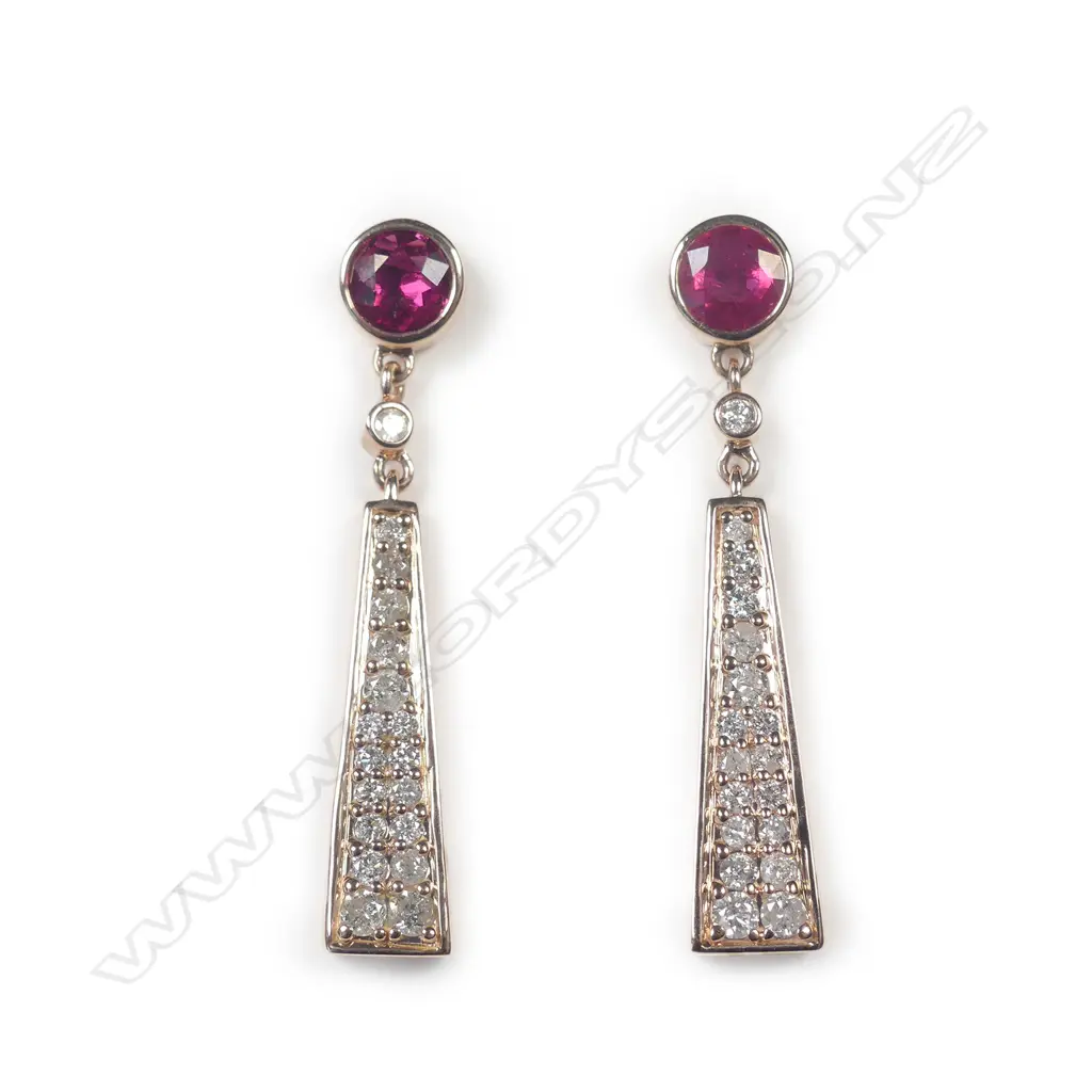 A pair of 14ct rose gold ruby and diamond drop earrings Image 1++