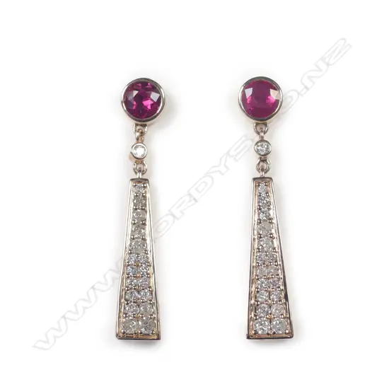 A pair of 14ct rose gold ruby and diamond drop earrings