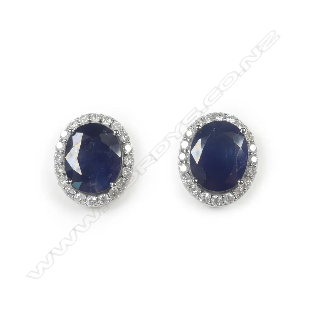 A pair of14ct white gold sapphire and diamond stud earrings Image 1++