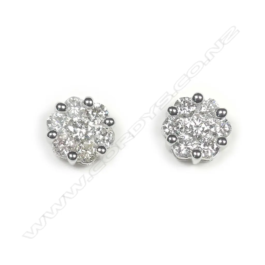 A pair of modern 18ct diamond set cluster earrings Image 1++