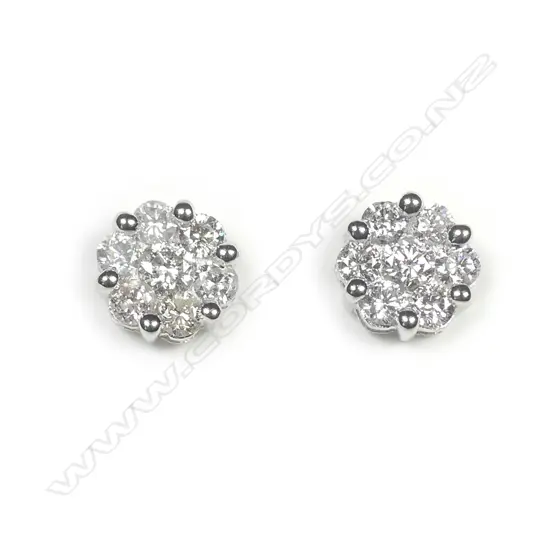 A pair of modern 18ct diamond set cluster earrings