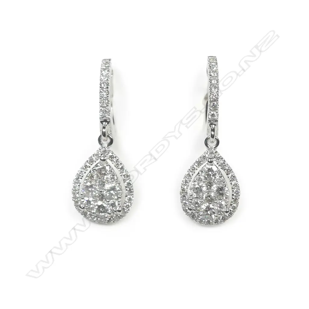 A pair of 18ct white gold diamond cluster earrings Image 1++