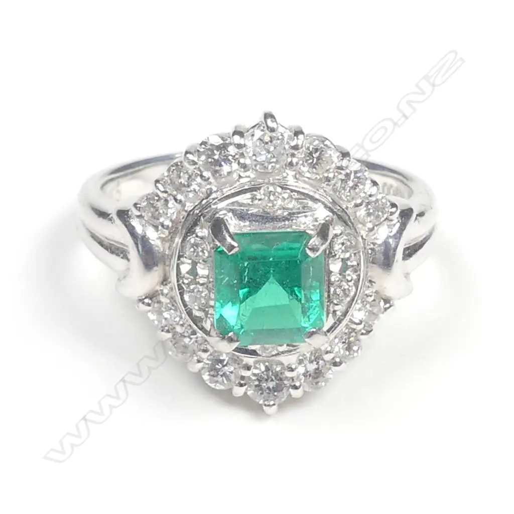 A platinum emerald and diamond dress ring Image 1++