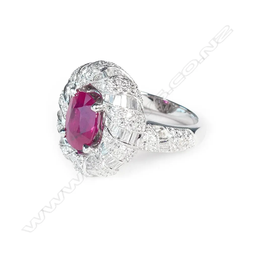 A vibrant 18ct white gold ruby and diamond dress ring Image 1++