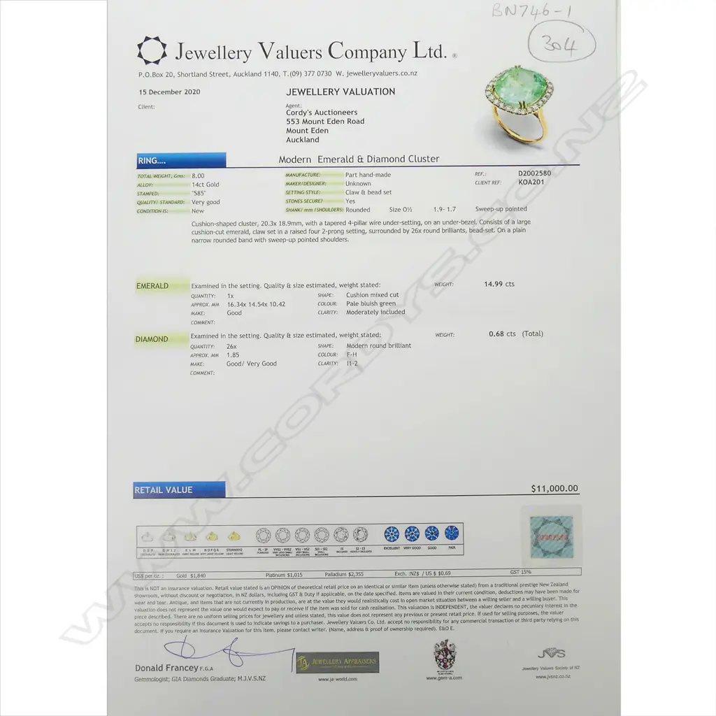 A 14ct gold emerald and diamond ring Image 1++