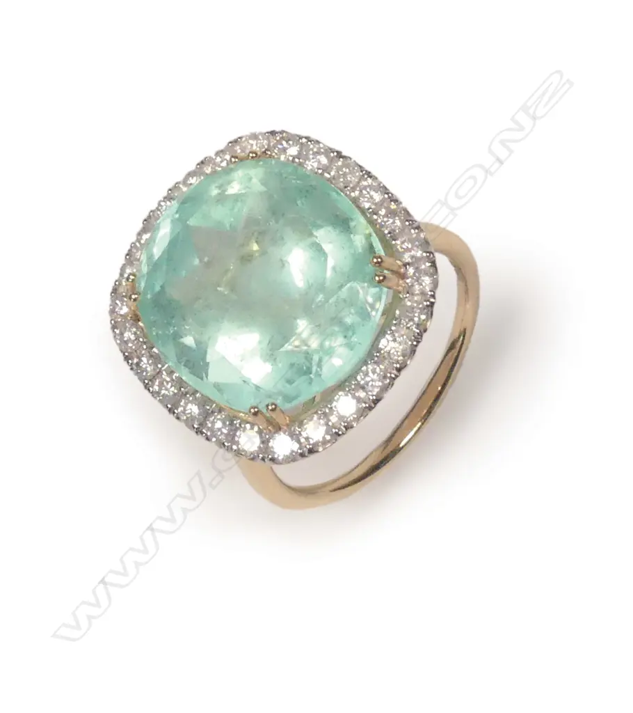 A 14ct gold emerald and diamond ring Image 1++