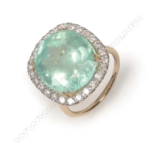 A 14ct gold emerald and diamond ring