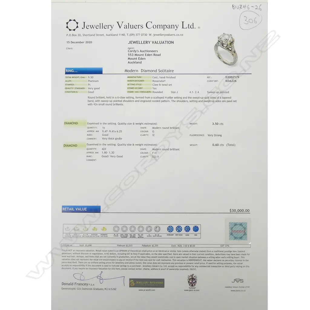 A platinum and diamond ring Image 1++