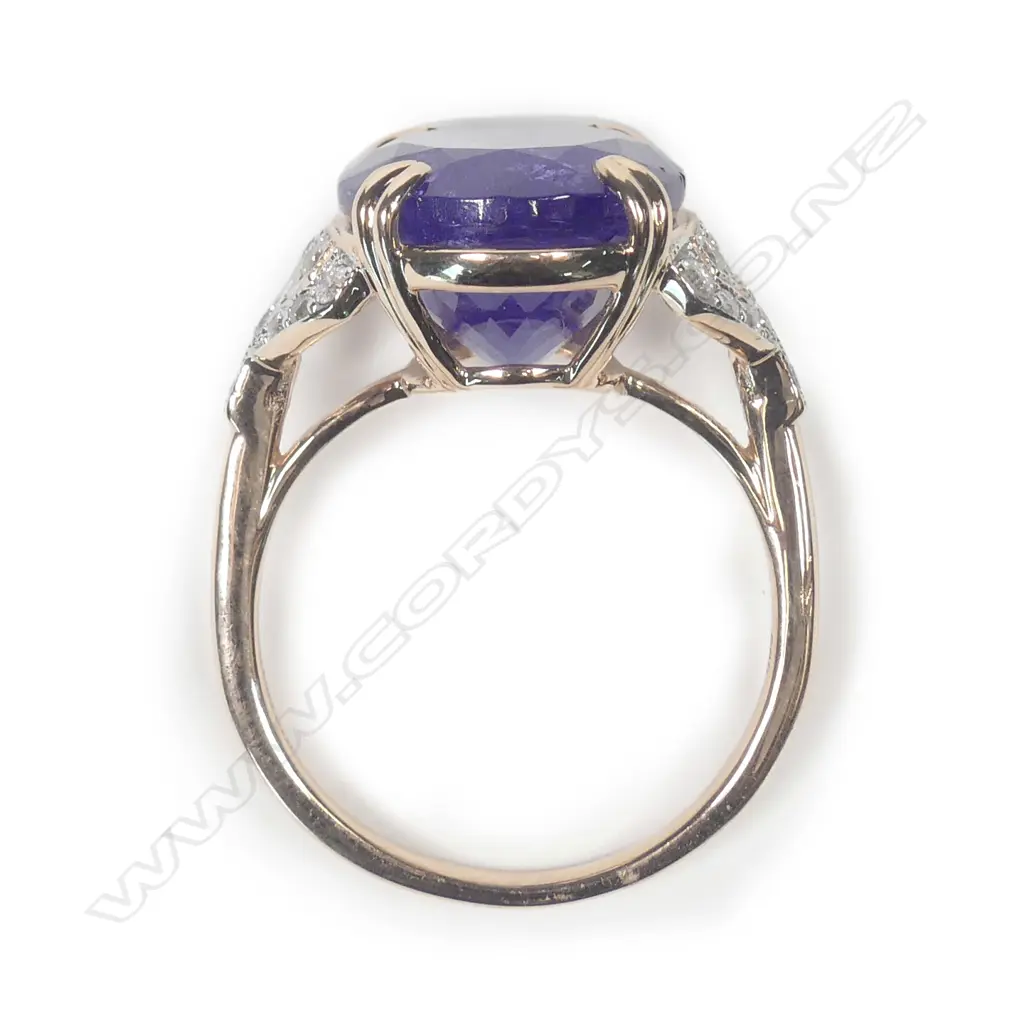 A 14ct rose gold tanzanite and diamond ring Image 1++