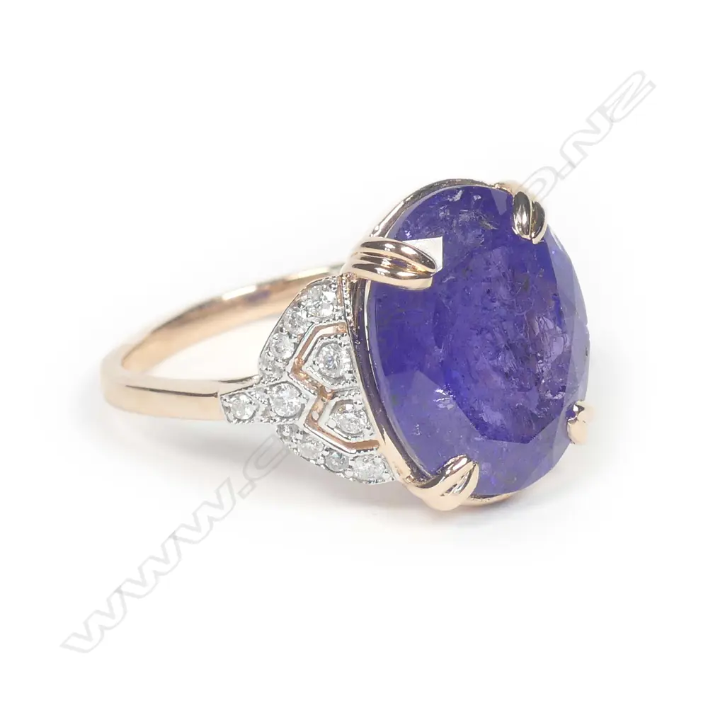 A 14ct rose gold tanzanite and diamond ring Image 1++