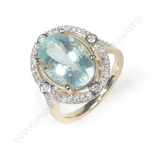 A 14ct yellow gold aquamarine and diamond ring