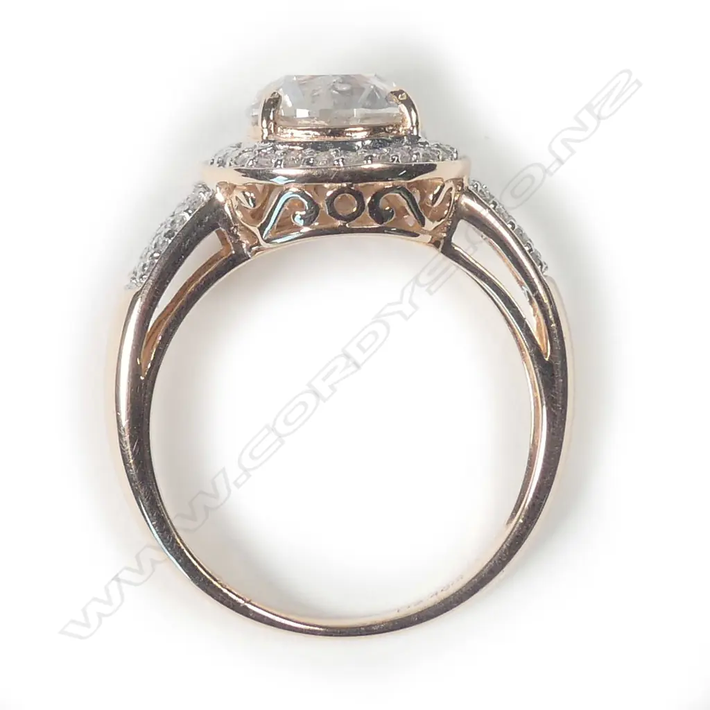 A 14ct rose gold diamond ring Image 1++