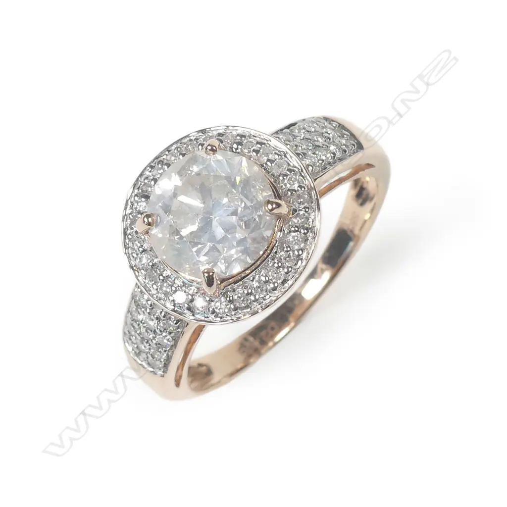 A 14ct rose gold diamond ring Image 1++