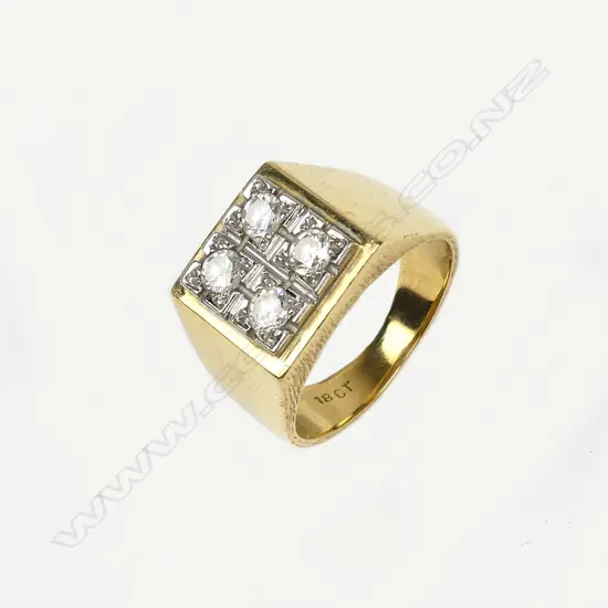 An 18ct gold and diamond gent's ring