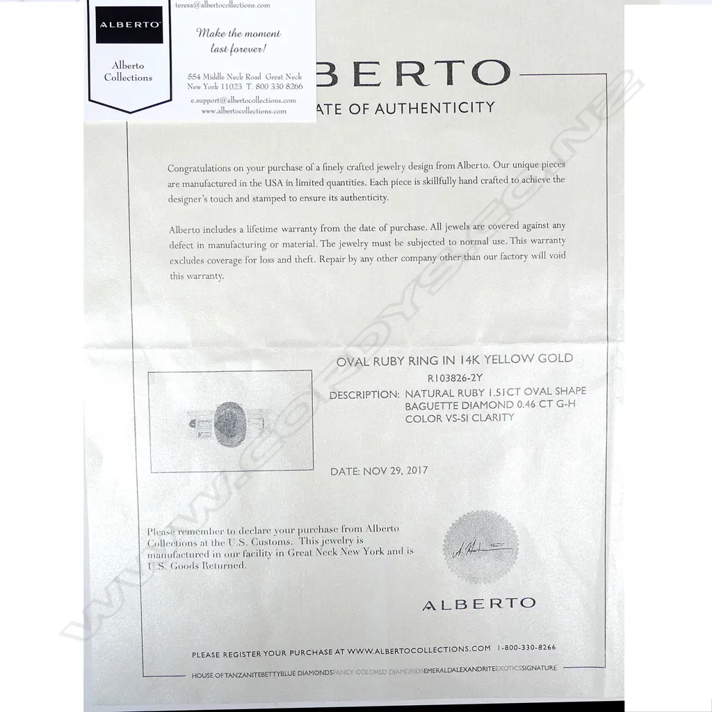 A 14ct gold ruby and diamond ring Image 1++