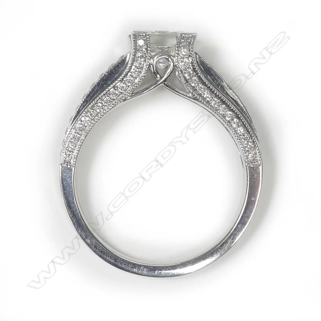An 18ct white gold and diamond solitaire ring Image 1++