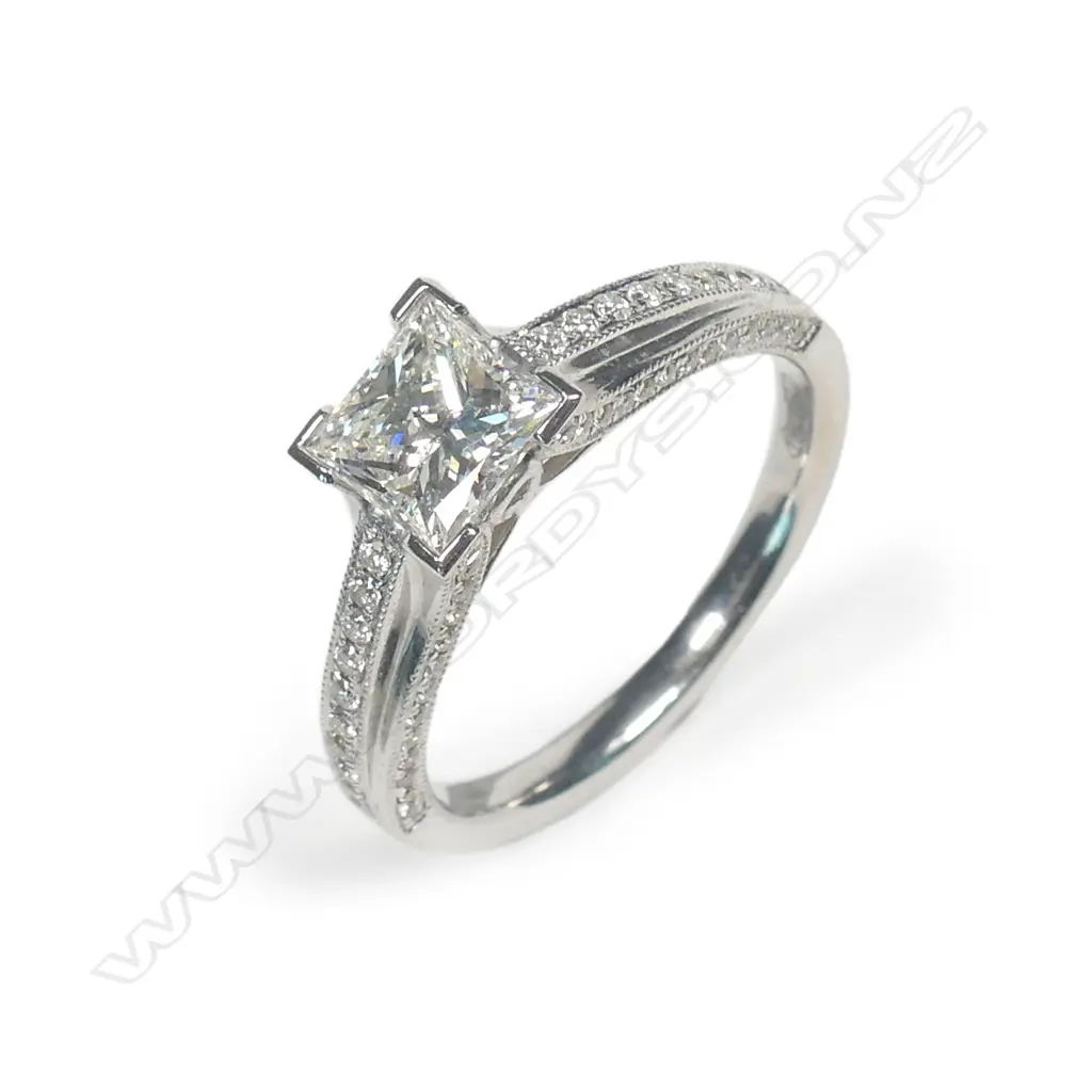 An 18ct white gold and diamond solitaire ring Image 1++