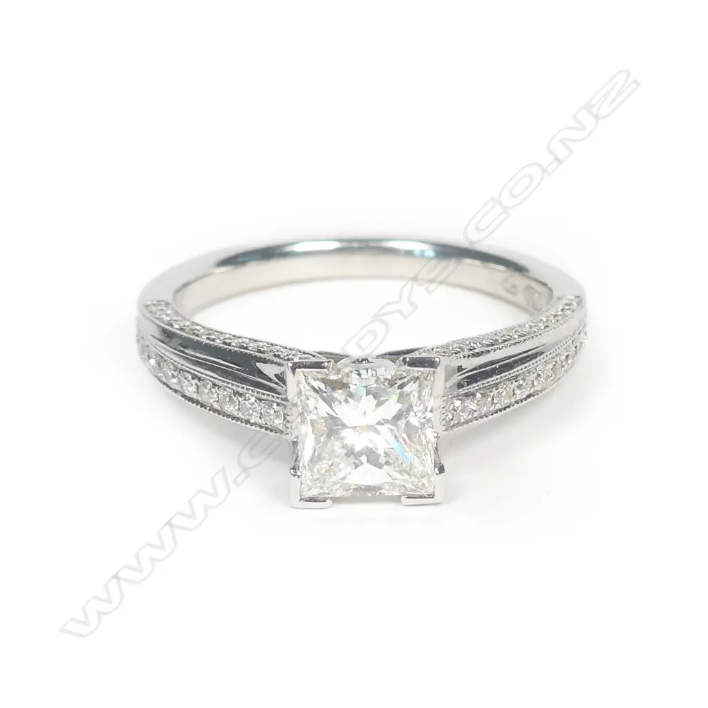 An 18ct white gold and diamond solitaire ring Image 1++