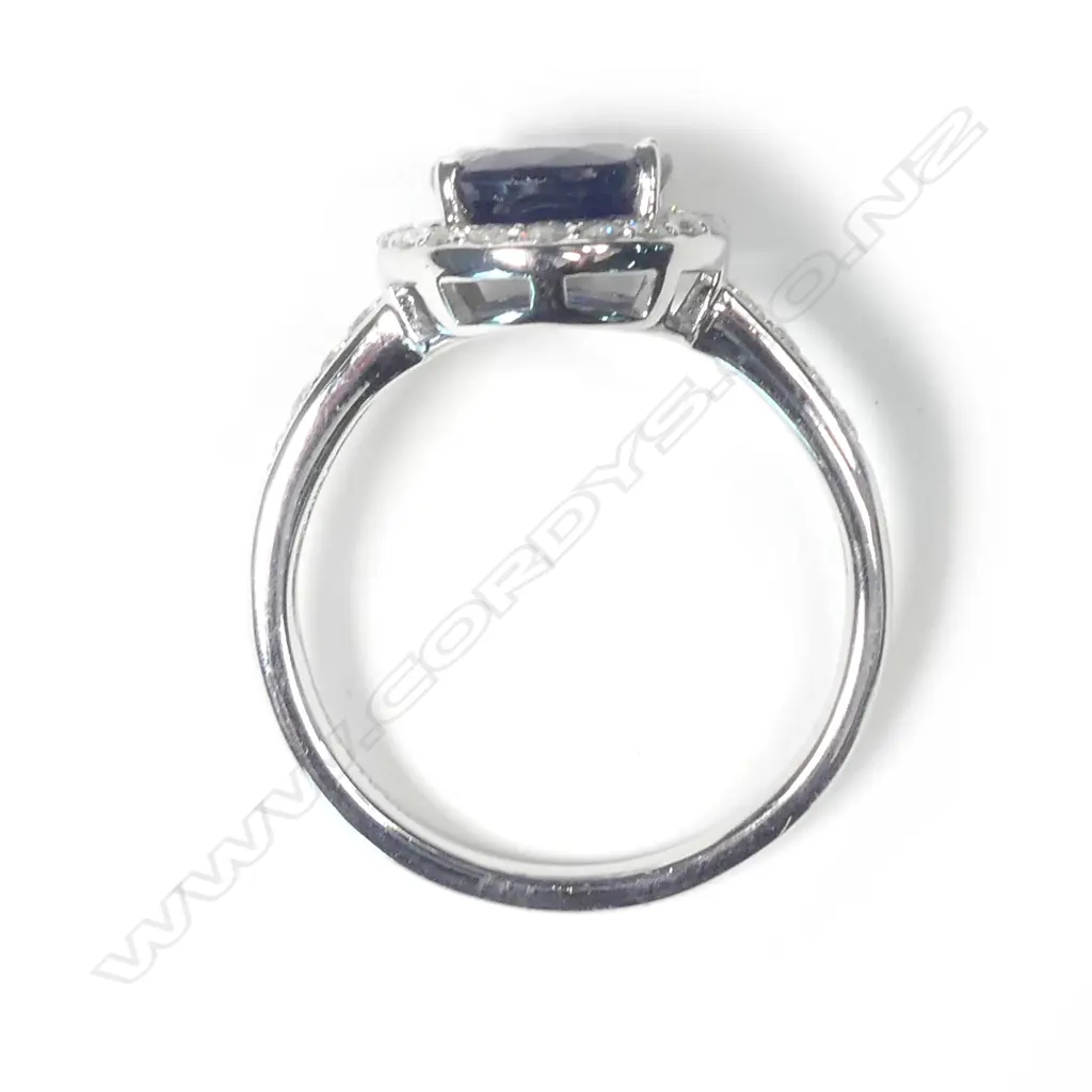 A 14ct white gold sapphire and diamond ring Image 1++