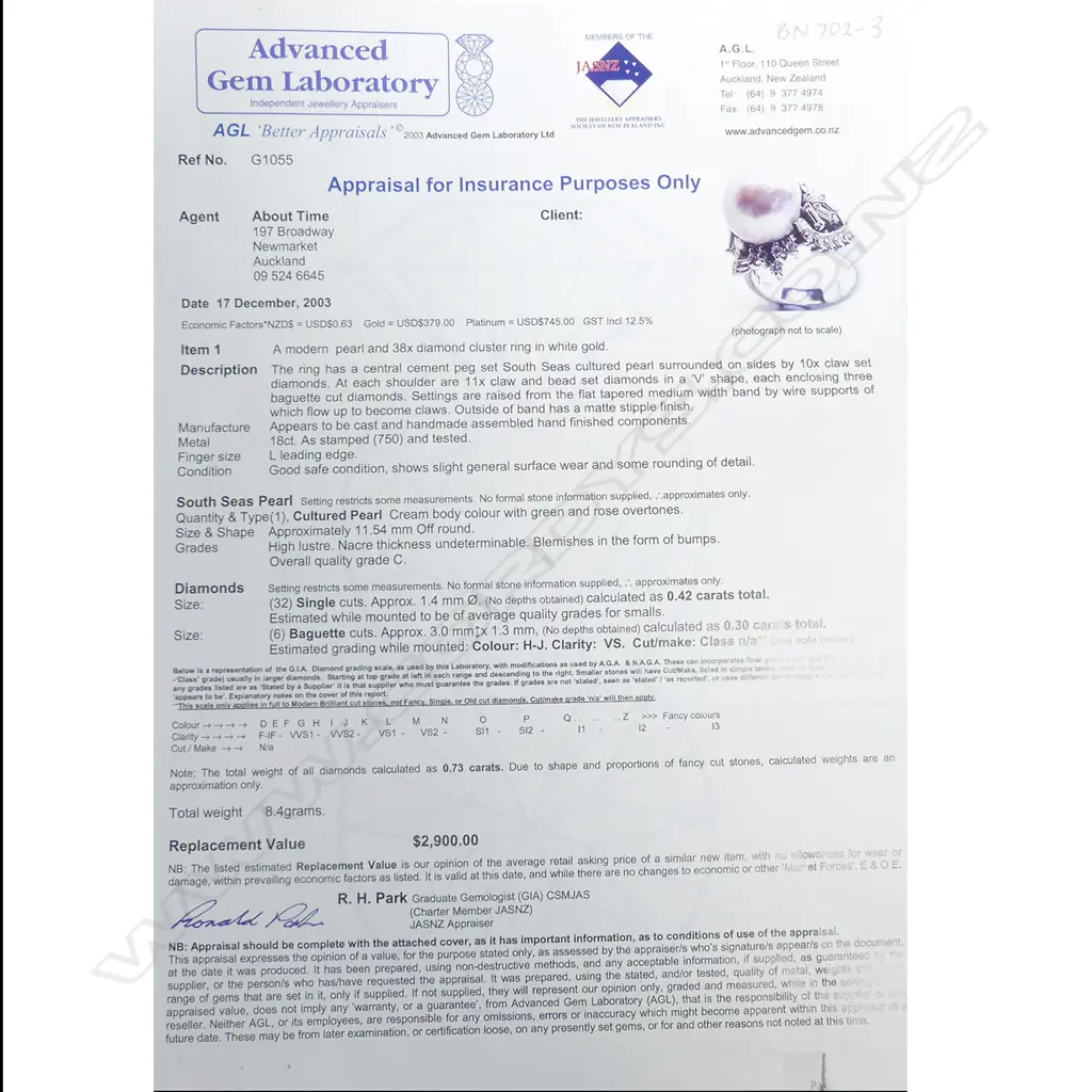 An 18ct white gold pearl and diamond ring Image 1++