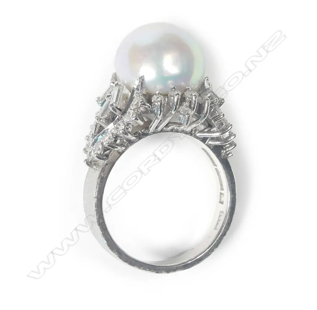 An 18ct white gold pearl and diamond ring Image 1++