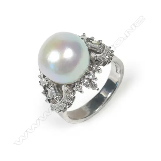 An 18ct white gold pearl and diamond ring