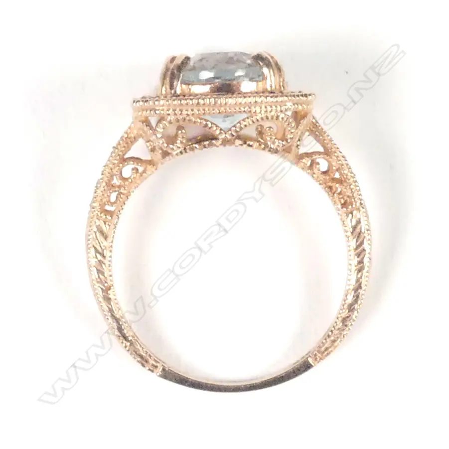 A 14ct rose gold aquamarine & diamond ring Image 1++